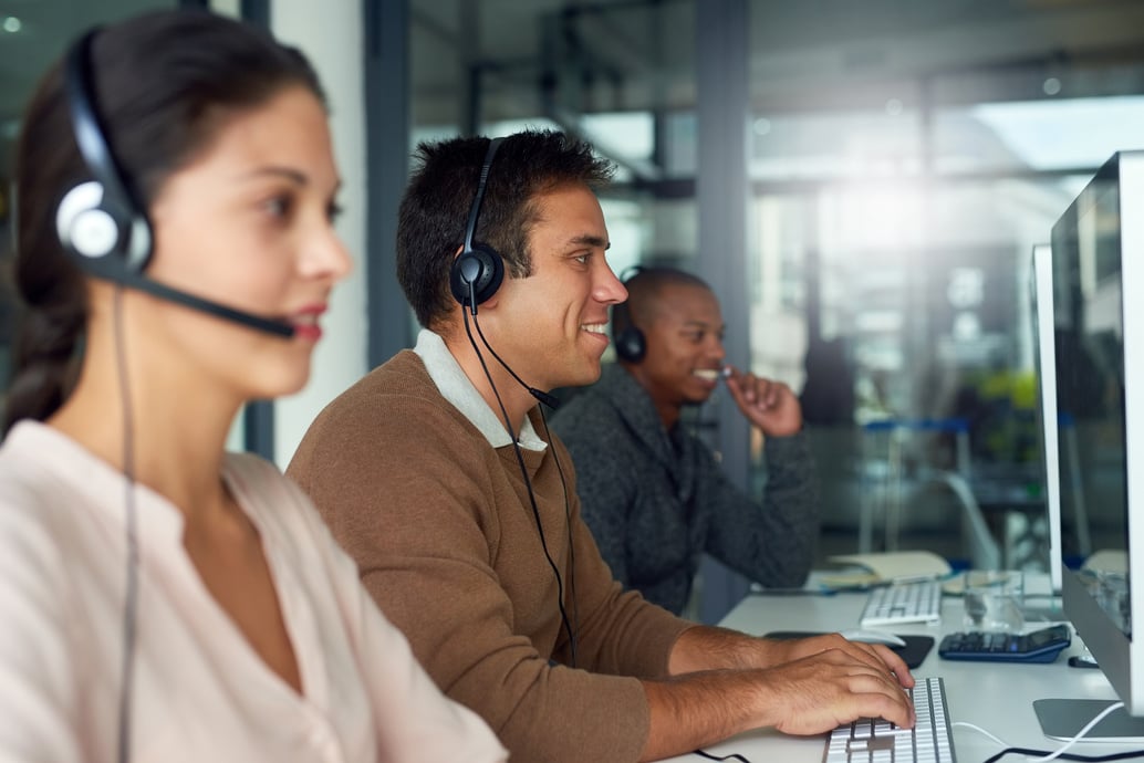 Striking sales one after another. Shot of call centre agents